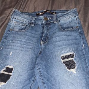 Cloth under rips jeggings